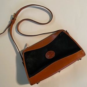 Dooney & Bourke blk/natural leather shoulder bag, some wear, $45.